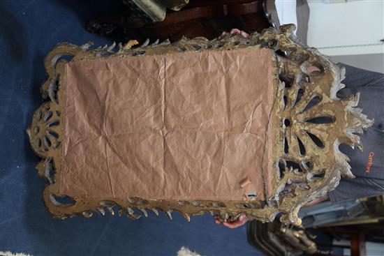 A George II carved giltwood wall mirror, H.4ft 6in. W.2ft 4in.